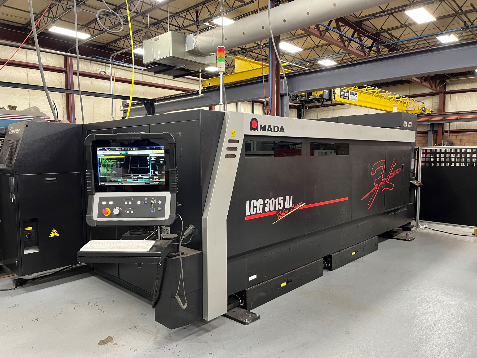 Amada LCG 3015 AJ Fiber Laser Cutting System