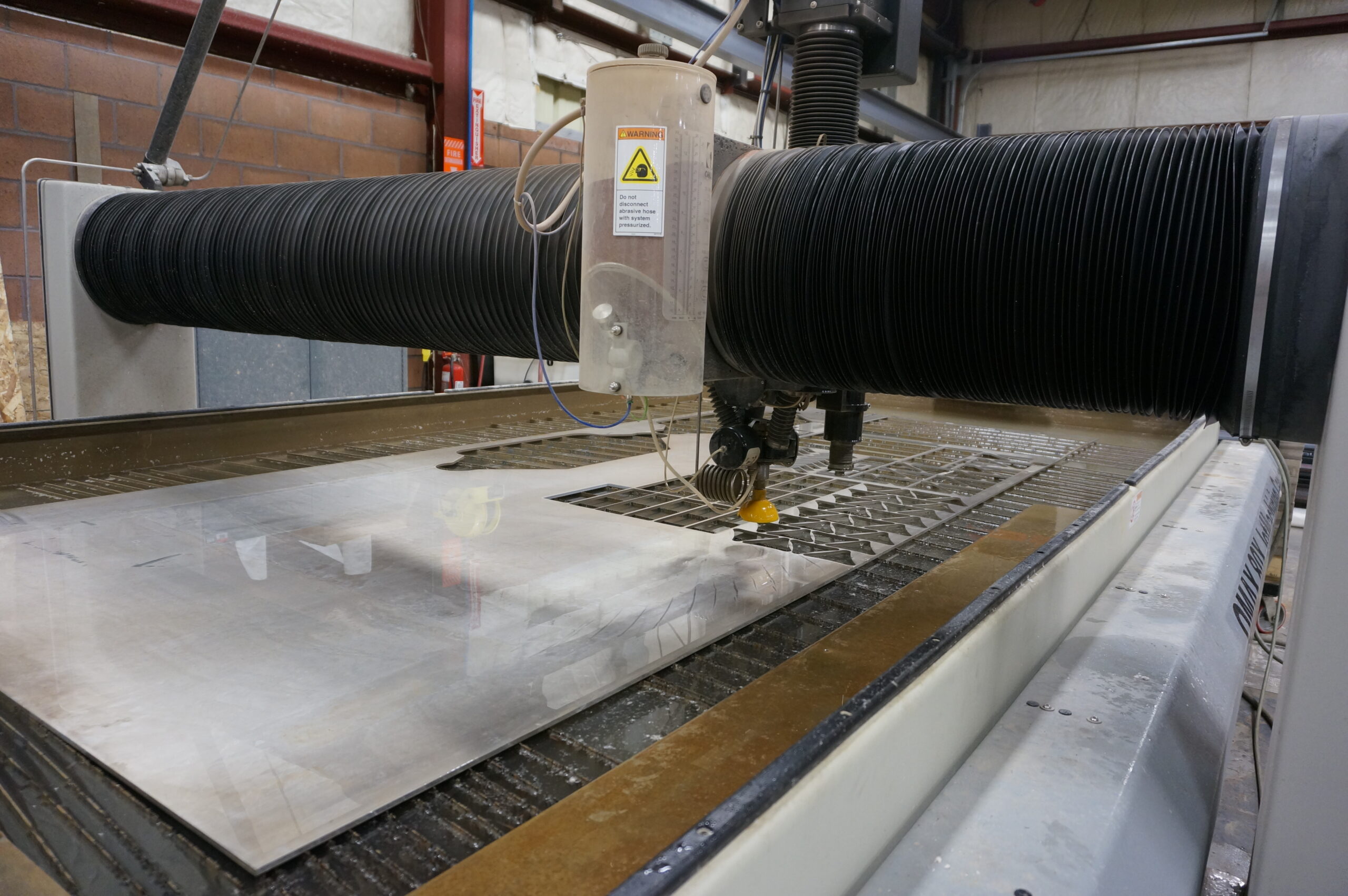 Understanding Water Jet Cutting vs. Laser Cutting for Precision Manufacturing